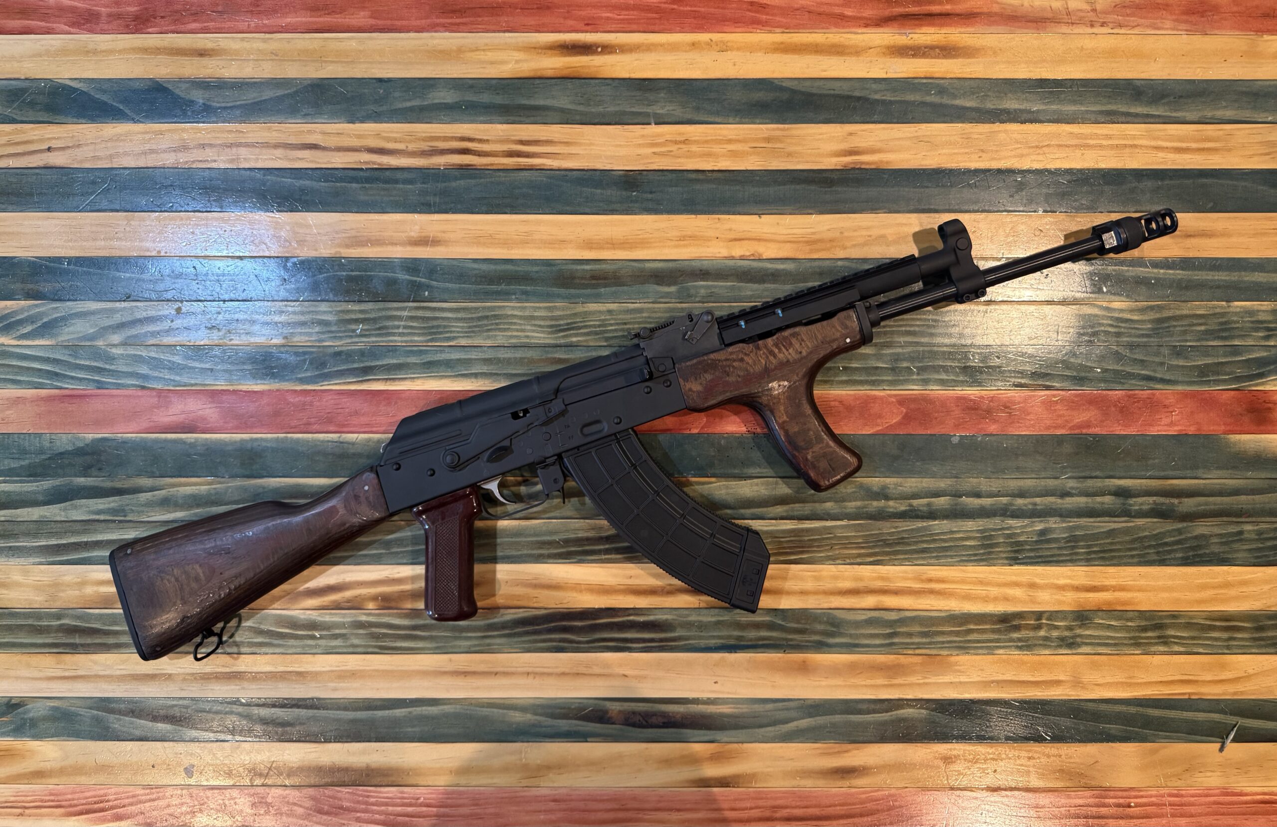 The War Machine Romanian MD63 AK rifle with railed gas tube and muzzle brake